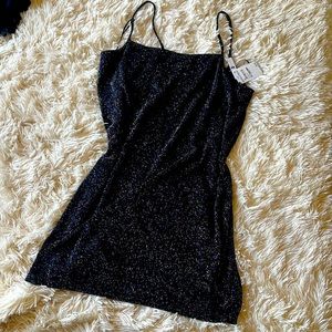 Never worn! Nice form fitting mini dress